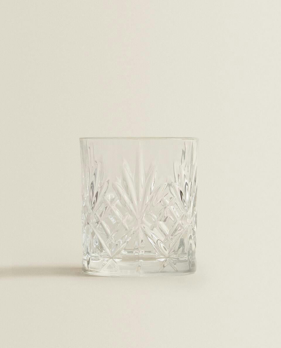 CRYSTALLINE TUMBLER WITH RAISED DESIGN