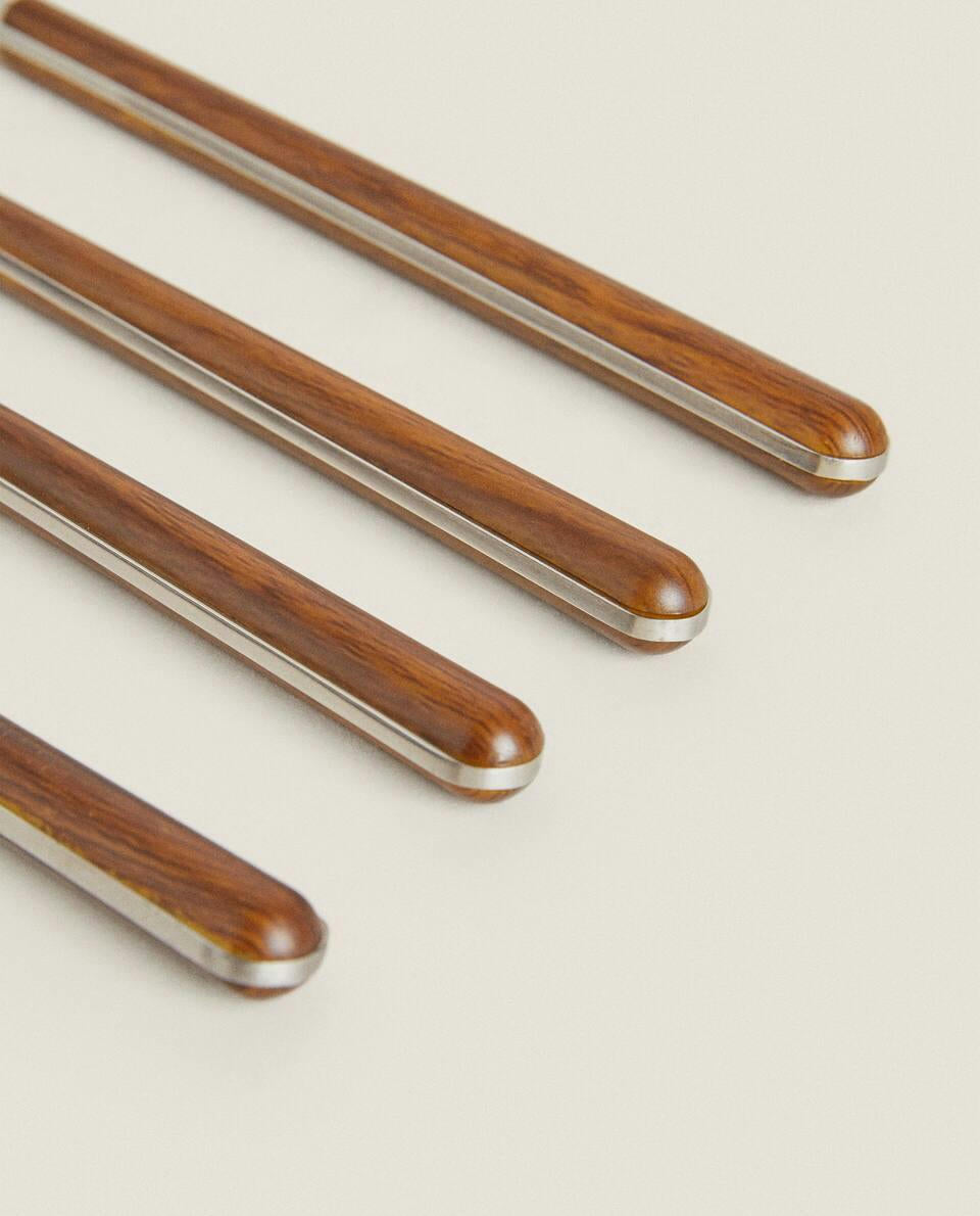 BOX 4 KNIVES WITH ROUND HANDLE DETAIL
