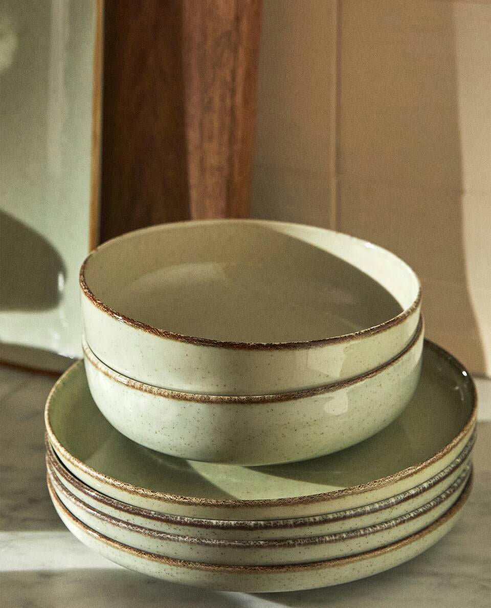 PORCELAIN BOWL WITH ANTIQUE FINISH RIM