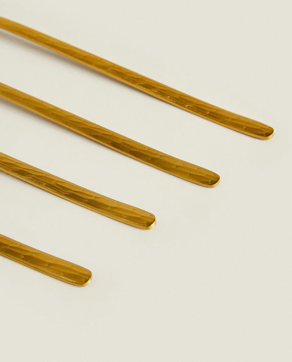 BOX OF 4 SPOONS WITH HAMMERED HANDLE