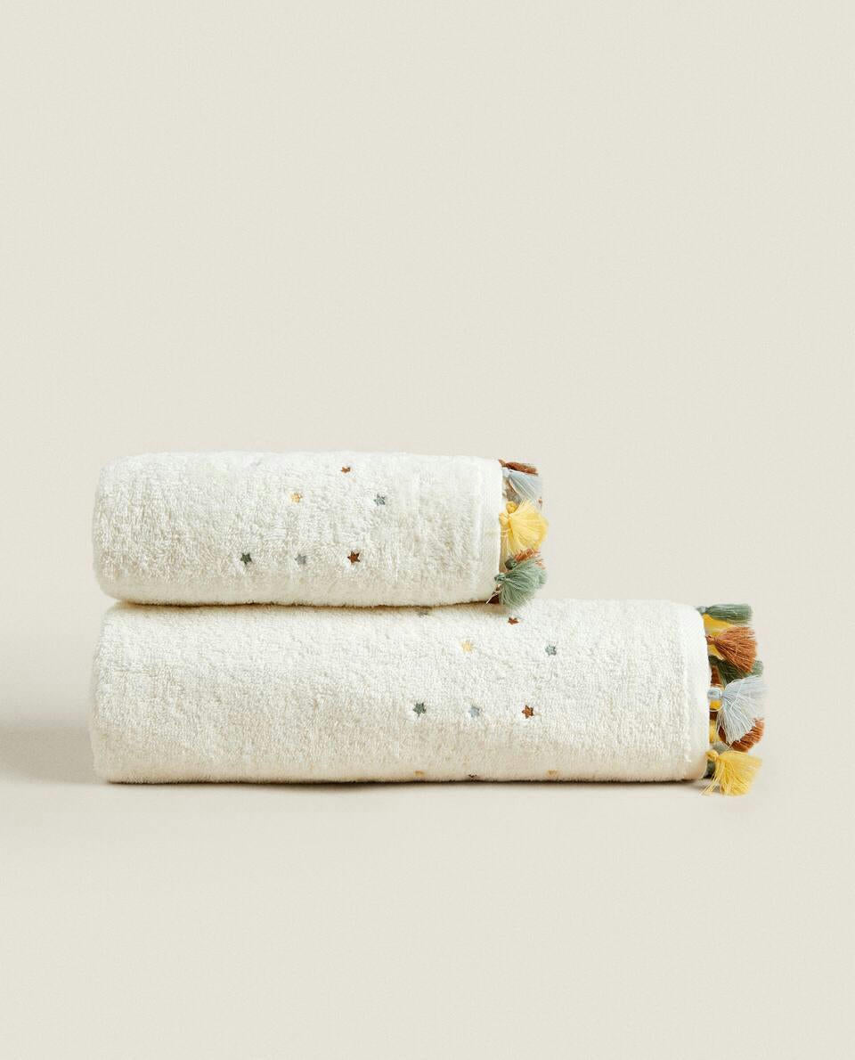 TOWEL WITH TASSELS AND STARS