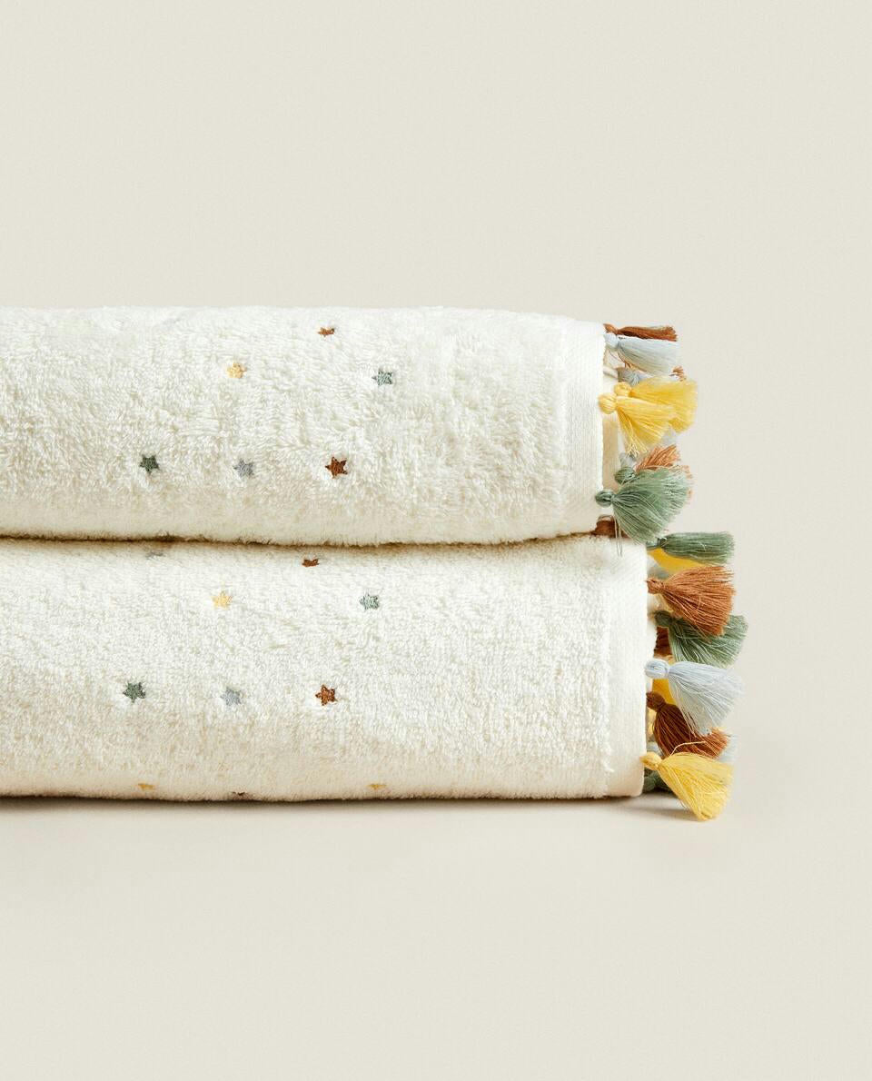 TOWEL WITH TASSELS AND STARS