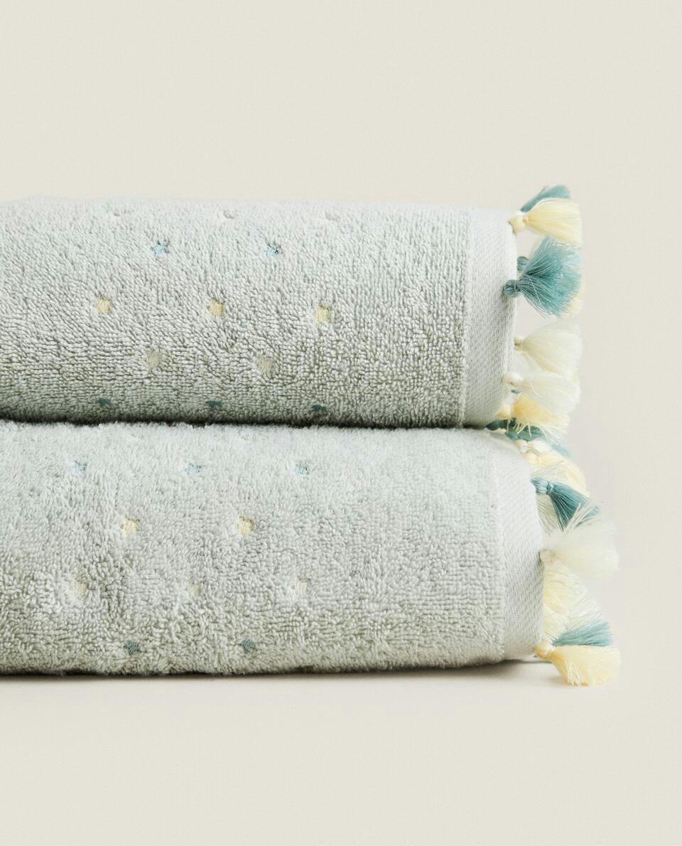 TOWEL WITH TASSELS AND STARS