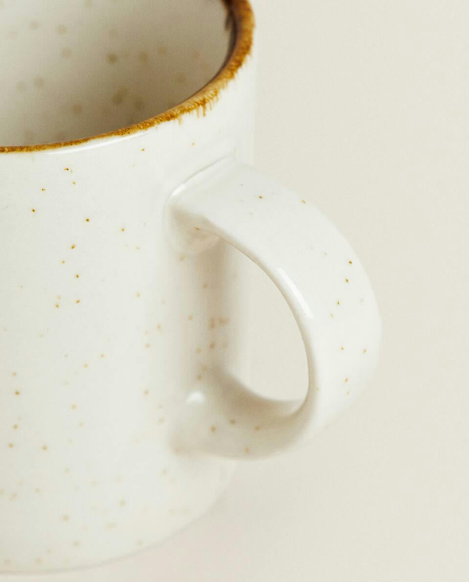 PORCELAIN MUG WITH ANTIQUE FINISH RIM